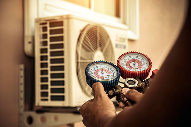 Professional Heat Pump Repair technician working in Woodstock, GA